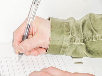 Close-up of man holding hands