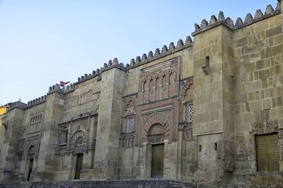 Low angle view of historic building against sky