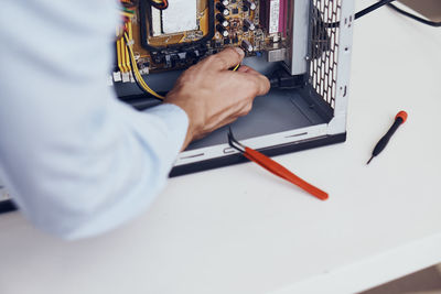 High angle view of man working on table