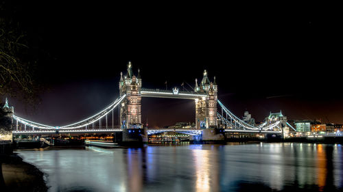 Illuminated london bridge at night