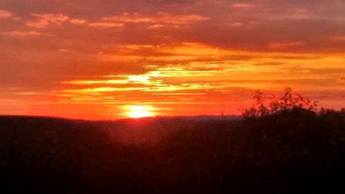 Scenic view of sunset over landscape