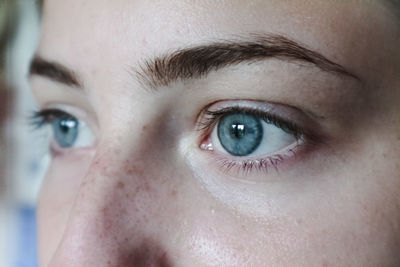 Close-up of woman with blue eyes