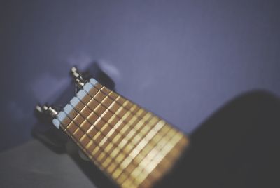 Close up of guitar on table