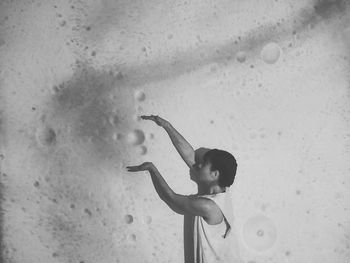 Boy swimming in sea