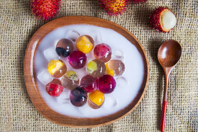 Directly above shot of fruit jelly dessert served in plate on table