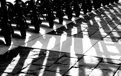 High angle view of people walking on footpath