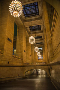 Low angle view of illuminated chandeliers at grand central station