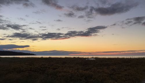 Scenic view of sea at sunset