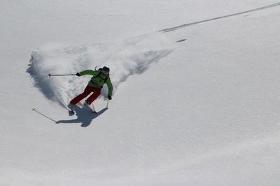 Blurred motion of man skiing