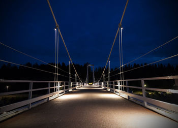 View of suspension bridge at night