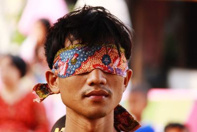 Close-up portrait of a man with a batik