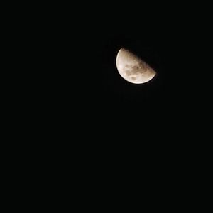 Low angle view of moon in sky