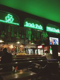 Illuminated text at night