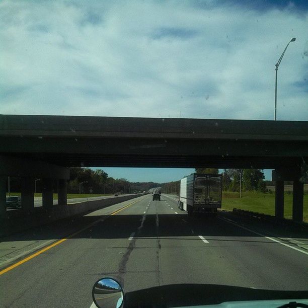 transportation, road, road marking, sky, car, mode of transport, land vehicle, built structure, architecture, the way forward, street, cloud - sky, connection, cloud, bridge - man made structure, building exterior, diminishing perspective, day, on the move, outdoors