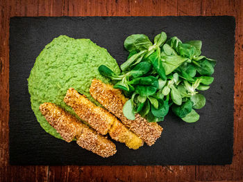 High angle view of vegetables on cutting board