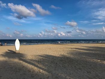 Scenic view of beach against sky