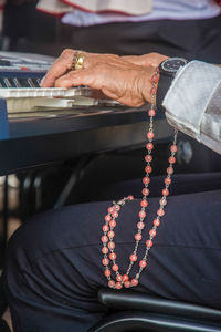 Closed portrait of a hand playing the piano 