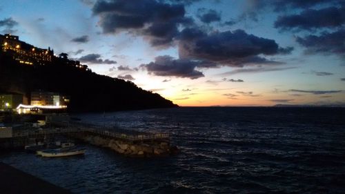 Scenic view of sea against cloudy sky