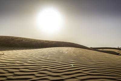 Scenic view of desert against sky