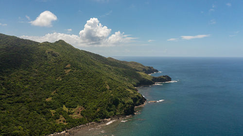 Tropical island cape and blue ocean. cape engano. palaui island. santa ana philippines.