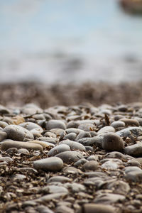 Close-up of stones on beach