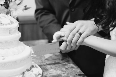 Midsection of woman holding ice cream