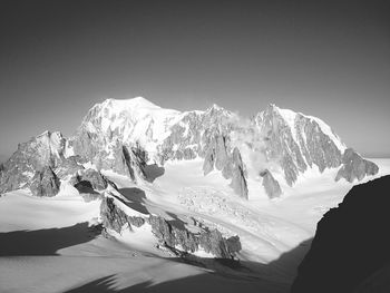 Scenic view of snowcapped mountain against sky