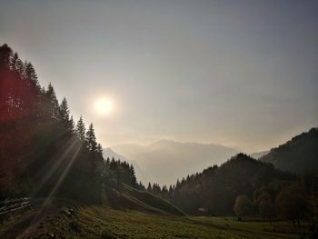 Scenic view of landscape against sky during sunset