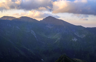 Scenic view of mountains against sky during sunset