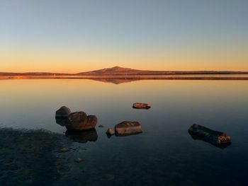 Scenic view of sea against sky during sunset