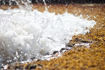 Close-up of waves splashing in water