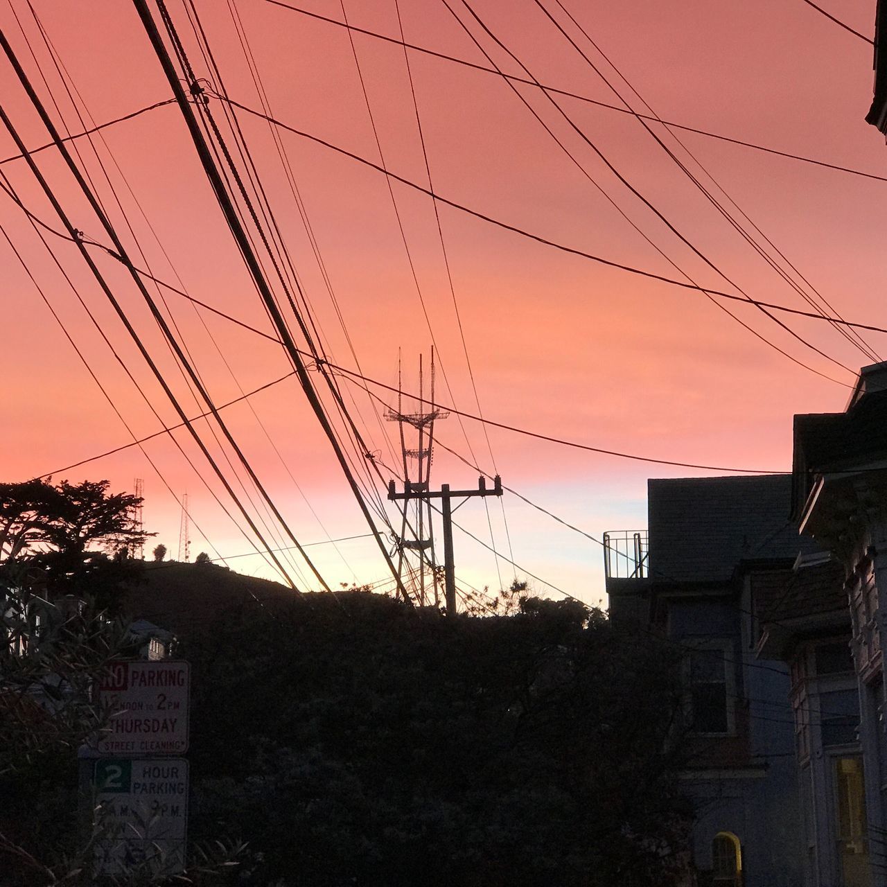 LOW ANGLE VIEW OF SILHOUETTE BUILDING AGAINST SKY