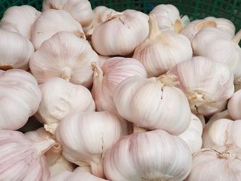 Full frame shot of garlic for sale in market