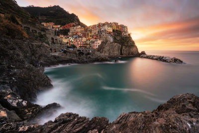 Scenic view of sea against sky during sunset