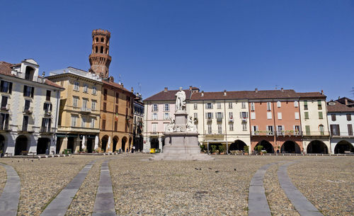 Piazza cavour, the central square of the town, dominated by the torre dell'angelo - angel's tower