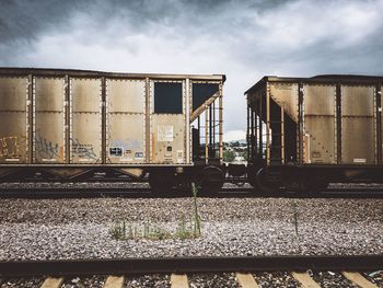 Train on railroad track against sky