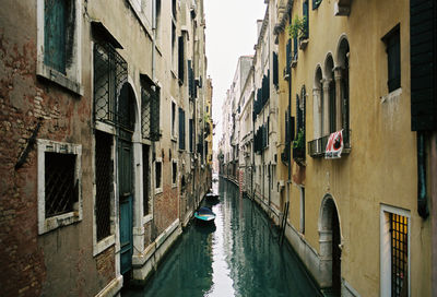 Panoramic view of canal amidst buildings