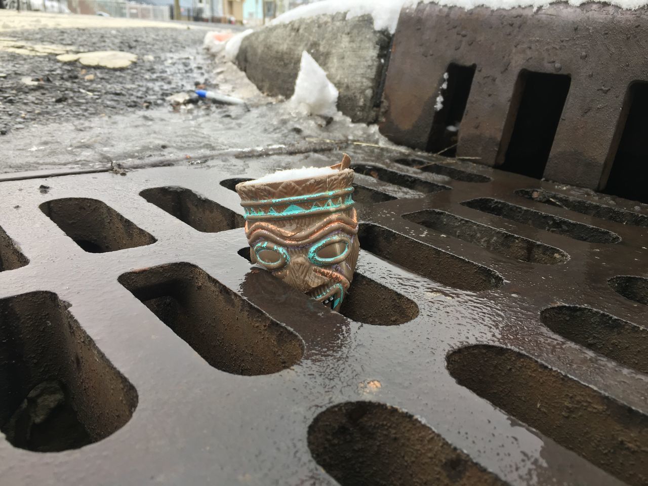 HIGH ANGLE VIEW OF WET TABLE BY STREET IN CITY