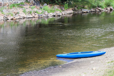 Boat moored in lake