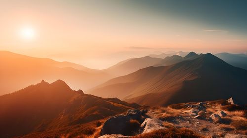 Scenic view of mountains against sky during sunset