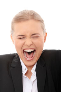 Portrait of man with eyes closed against white background