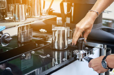 Cropped image of man working on table