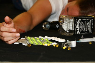 Close-up of hands on table