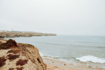 Scenic view of sea against clear sky