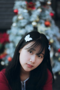 Portrait of young woman looking away