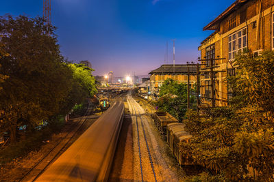Railroad tracks against blue sky