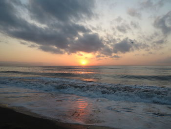 Scenic view of sea against sky during sunset