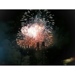 Firework display at night