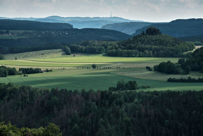 Scenic view of landscape and mountains against sky