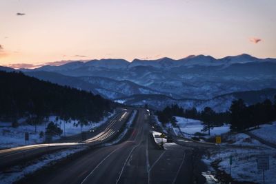 High angle view of road on snow covered landscape